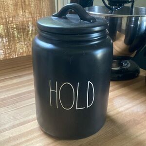 Ray Dunn black ceramic canister HOLD with white letters. larger size.